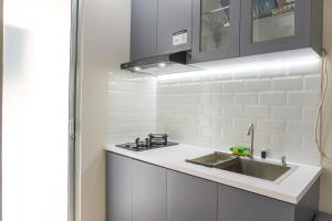 Strategic and Warm Studio at Bassura City Apartment By Travelio