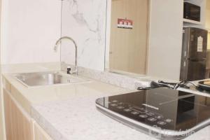 Serene and Cozy 2BR at Meikarta Apartment By Travelio