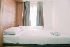 Best Deal and Comfort 2BR Green Pramuka City Apartment By Travelio