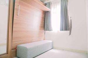 Best Deal and Comfort 2BR Green Pramuka City Apartment By Travelio
