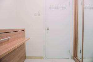 Best Deal and Comfort 2BR Green Pramuka City Apartment By Travelio