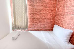 Comfort and Homey 3BR Bassura City Apartment By Travelio