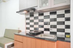 Gorgeous and Homey 2BR Bassura City Apartment near Mall By Travelio