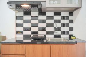 Gorgeous and Homey 2BR Bassura City Apartment near Mall By Travelio