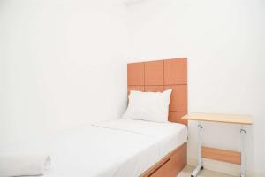 Gorgeous and Homey 2BR Bassura City Apartment near Mall By Travelio