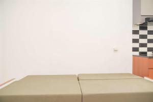 Gorgeous and Homey 2BR Bassura City Apartment near Mall By Travelio