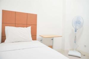 Gorgeous and Homey 2BR Bassura City Apartment near Mall By Travelio