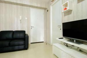 Comfort and Nice 2BR Apartment at Bassura City By Travelio