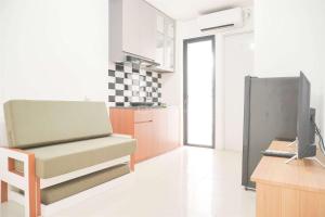 Gorgeous and Homey 2BR Bassura City Apartment near Mall By Travelio