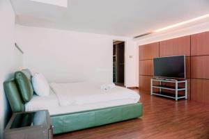 Wonderful and Homey Studio Citylofts Sudirman Apartment By Travelio
