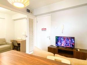 Good Deal and Minimalist 1BR at Bassura City Apartment By Travelio