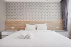 Minimalist and Comfort Studio Apartment at Springhill Terrace Residence By Travelio