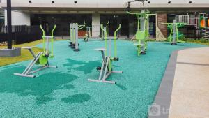 Warm and Elegant 2BR at The Kensington Royal Suites Apartment By Travelio