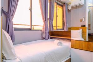 Comfort Stay 2BR at Daan Mogot City Apartment By Travelio