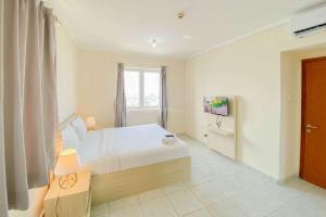 Comfort and Homey Studio Grand Palace Kemayoran Apartment By Travelio