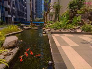 Elegant and Spacious 3BR Apartment at Casa Grande Residence By Travelio