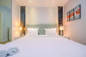 Spacious with City View 2BR Apartment at Casa Grande Residence By Travelio