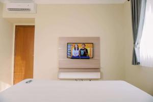 Spacious and Homey 2BR at Grand Palace Kemayoran Apartment By Travelio