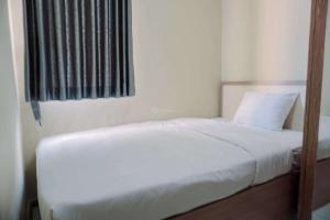 Spacious and Homey 2BR at Grand Palace Kemayoran Apartment By Travelio