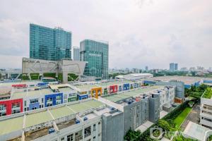 Nice and Elegant 1BR at The Kensington Royal Suites Apartment By Travelio