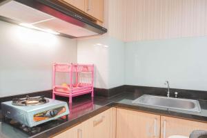 Comfort Living 1BR at The Boulevard Apartment By Travelio