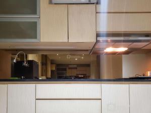 Minimalist and Comfy 1BR at The Boulevard Apartment By Travelio