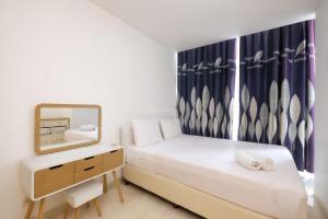 Comfort Stay 2BR at LAvenue Pancoran Apartment By Travelio