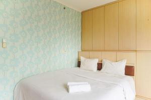 Cozy Living 1BR Maple Park Sunter Apartment By Travelio