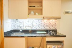 Homey and Nice 1BR at The Mansion Kemayoran Apartment By Travelio