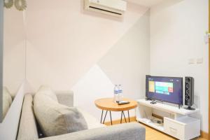 Homey and Nice 1BR at The Mansion Kemayoran Apartment By Travelio