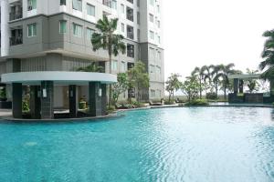 Full Furnished with Comfort Design 2BR Apartment at Thamrin Residence By Travelio
