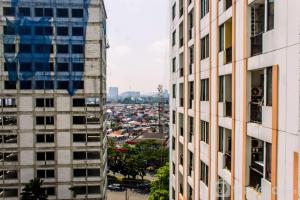 Warm and Homey 1BR at Cervino Village Casablanca Apartment By Travelio