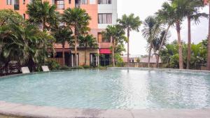 Warm and Homey 1BR at Cervino Village Casablanca Apartment By Travelio