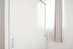 Modern and Homey 2BR at Signature Park Grande Apartment By Travelio