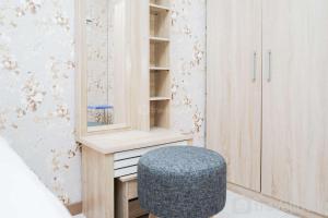 Homey Studio Apartment at Green Palm Residence By Travelio