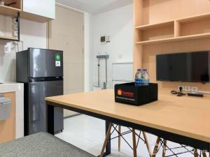 Relaxing 2BR at 35th Floor Tokyo Riverside PIK 2 Apartment By Travelio