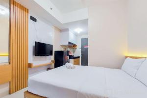 Minimalist Studio Apartment at Serpong Garden By Travelio