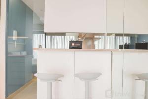 Cozy Stay Studio Apartment at Nine Residence By Travelio