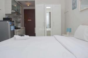 Stunning and Comfy Studio Signature Park Grande Apartment By Travelio