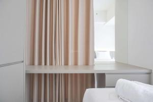 Comfort 2BR at 20th Floor Tokyo Riverside PIK 2 Apartment By Travelio