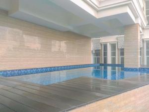 Elegant and Comfy Studio Loft Apple 1 Condovilla Apartment By Travelio