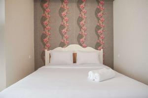 Modern and Strategic 2BR Casa De Parco Apartment near ICE BSD By Travelio