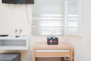 Compact Studio No Kitchen Apartment at Aeropolis Residence By Travelio