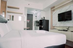 Simply Look Studio at Amazana Serpong Apartment By Travelio
