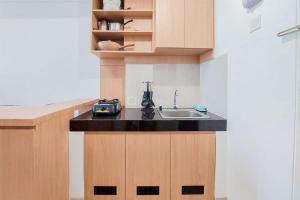 Simply Look and Warm 2BR at Serpong Garden Apartment By Travelio