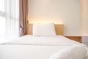 Modern Look and Nice 2BR Gold Coast Apartment near PIK By Travelio