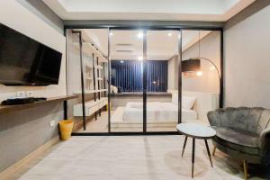 Cozy Living 1BR Collins Boulevard Apartment By Travelio