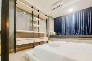 Cozy Living 1BR Collins Boulevard Apartment By Travelio