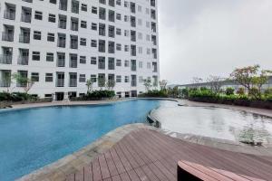 Cozy and Well Designed Studio Serpong Garden Apartment By Travelio