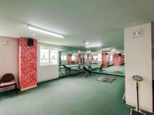 Homey Apartment with 1BR at Parahyangan Residence By Travelio